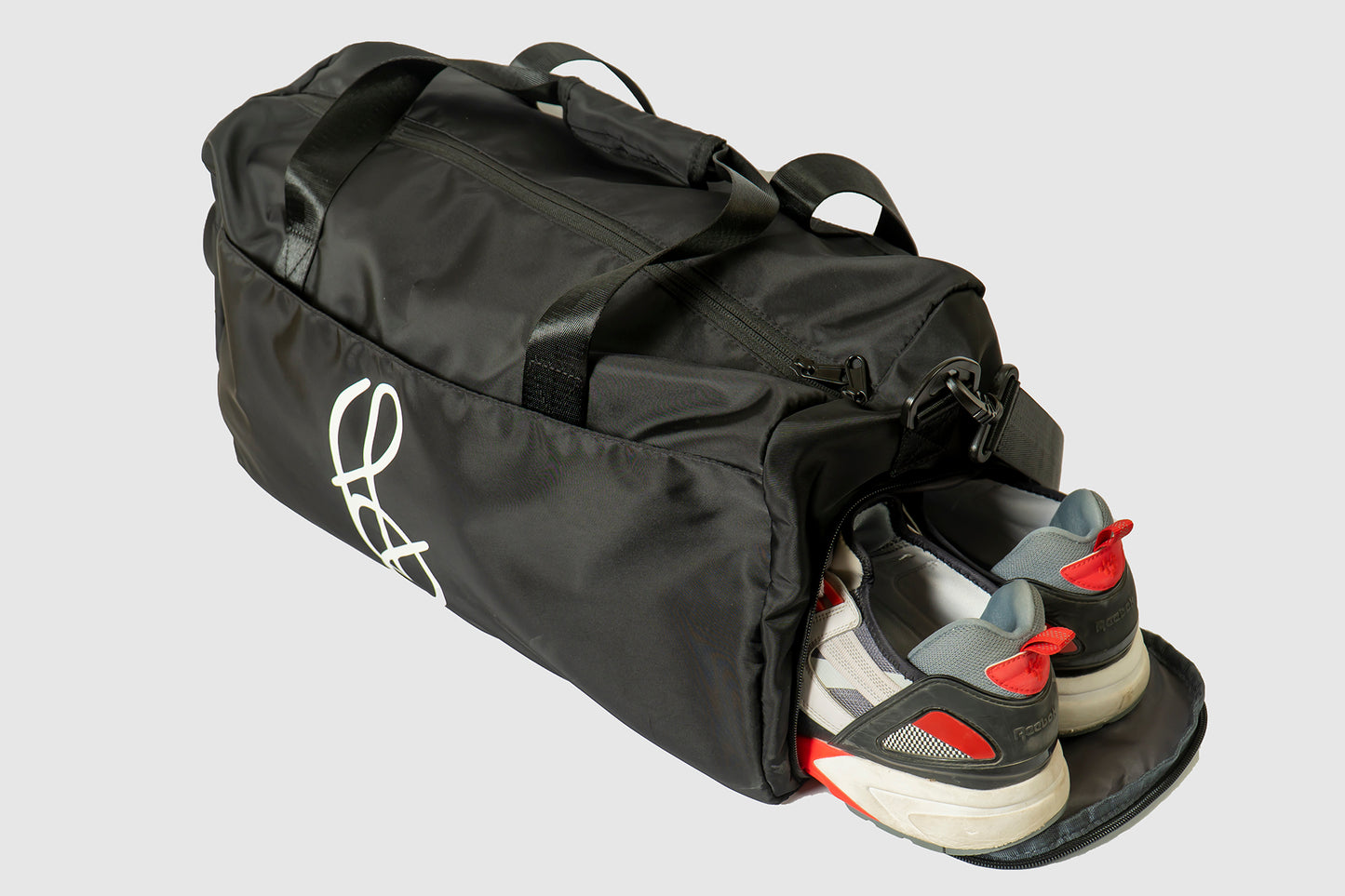 A water proof sports duffel bag with shoe compartment. 