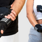 guy and girl wearing weightlifting gym gloves with wrist support 